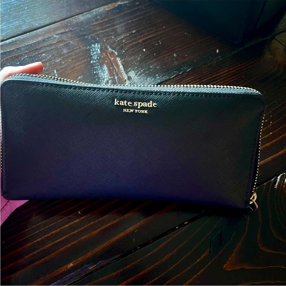 Kate Spade Black Zip-Around Wallet. Never used.